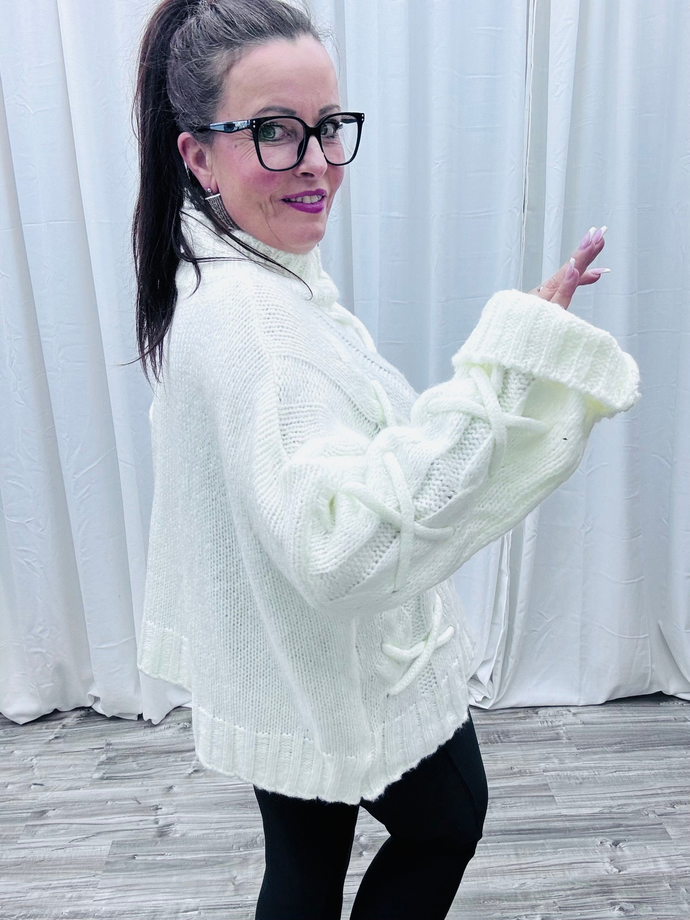 Strickpulli mit Kordeln Gr. 36-46/48   108